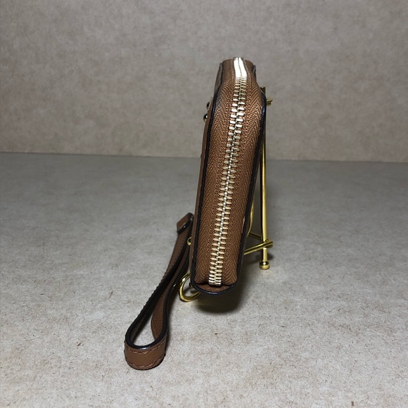 9. Michael Kors Cognac Zip Around Wristlet - Picture 3 of 14